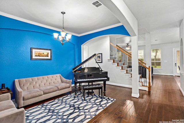 living room with stairway, baseboards, hardwood / wood-style flooring, and visible vents