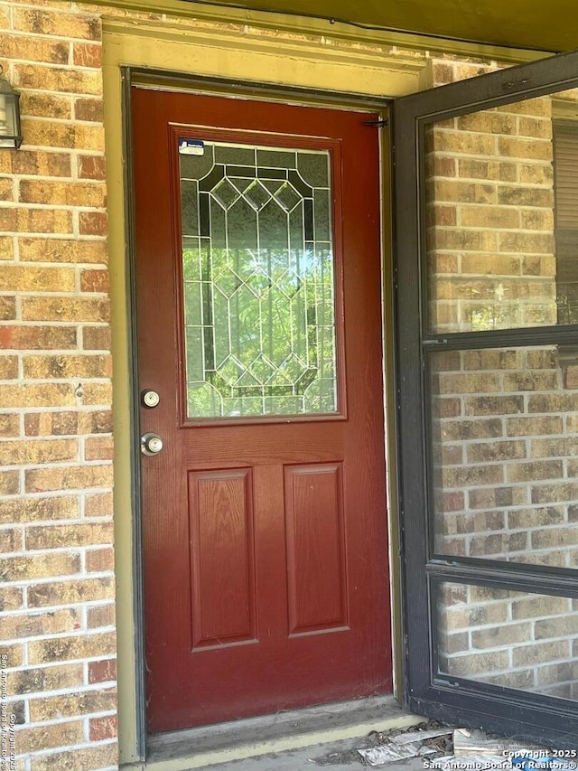 244 Lovett, San Antonio, TX 78211 - view of exterior entry with brick siding