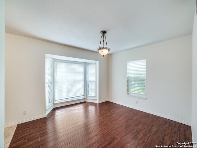 9327 Fernglen Dr, San Antonio, TX 78240 - unfurnished room featuring baseboards and wood finished floors