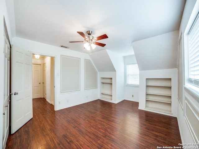 9327 Fernglen Dr, San Antonio, TX 78240 - bonus room with visible vents, built in shelves, wood finished floors, and vaulted ceiling