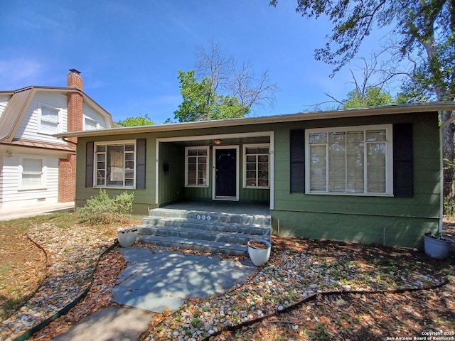 111 Blue Bonnet Blvd, Alamo Heights, TX 78209 - view of front of house featuring covered porch and a chimney