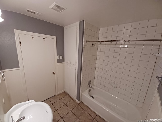 111 Blue Bonnet Blvd, Alamo Heights, TX 78209 - full bath with shower / bathtub combination, visible vents, a sink, and tile patterned flooring