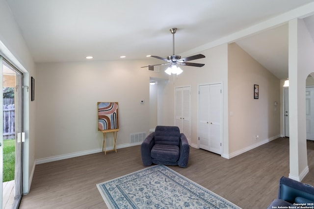 sitting room with baseboards, visible vents, and light wood-type flooring