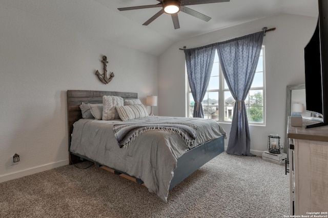 carpeted bedroom with baseboards, a ceiling fan, and lofted ceiling