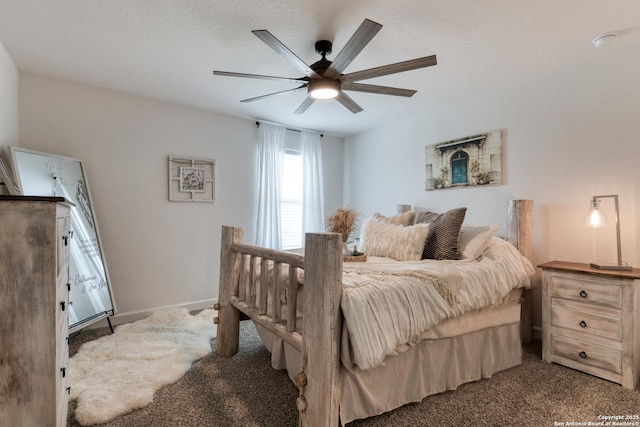 bedroom with carpet floors, ceiling fan, and baseboards