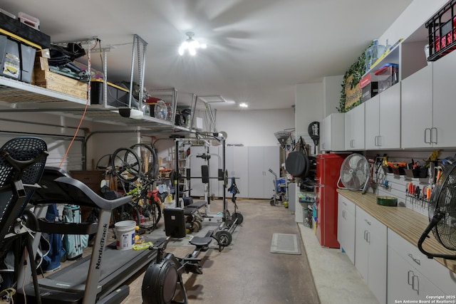 garage with a workshop area