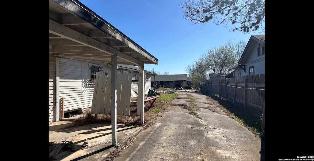 916 SW 39th, San Antonio, TX 78237 - exterior space with concrete driveway and fence