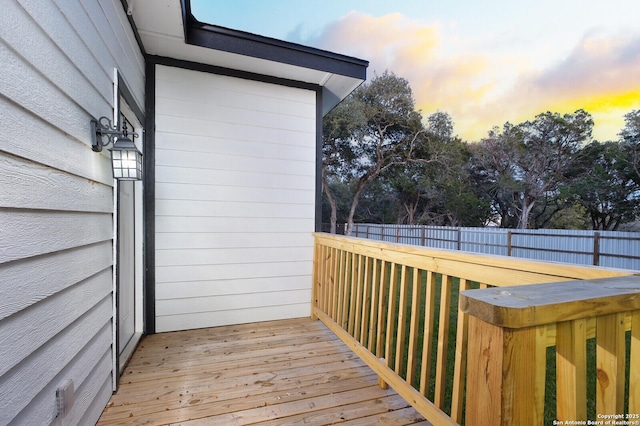 wooden deck featuring fence