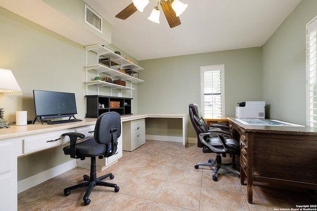 137A Spanish Pass, Boerne, TX 78006 - home office with a ceiling fan, light tile patterned flooring, and built in desk