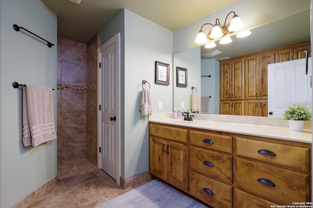 137A Spanish Pass, Boerne, TX 78006 - bathroom featuring vanity, a tile shower, and baseboards