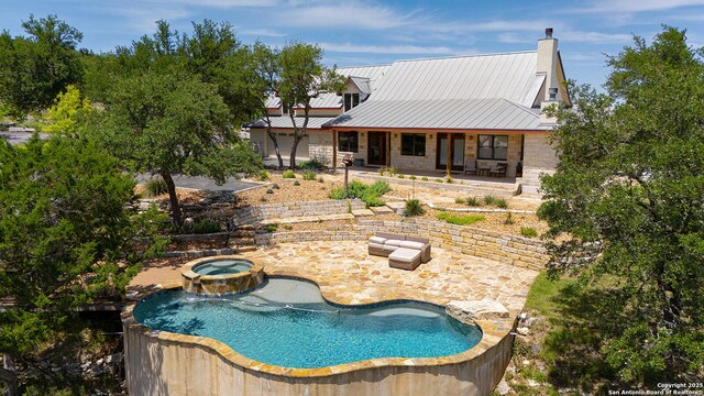 137A Spanish Pass, Boerne, TX 78006 - swimming pool with a patio area and an in-ground hot tub