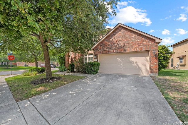 8715 Anton Chico, Helotes, TX 78023 - view of front of home with brick siding, a garage, and driveway
