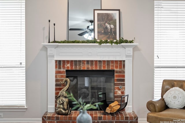 8715 Anton Chico, Helotes, TX 78023 - interior details with baseboards, ceiling fan, and a fireplace