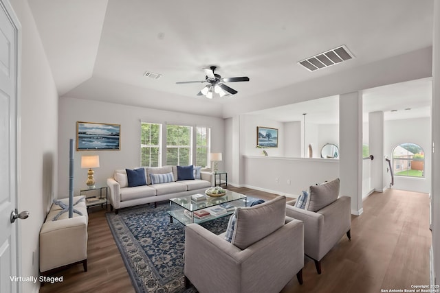 8715 Anton Chico, Helotes, TX 78023 - living room with visible vents, a ceiling fan, baseboards, and wood finished floors