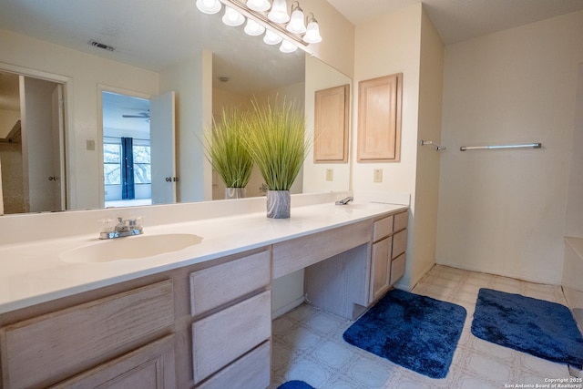 1903 Copperfield, San Antonio, TX 78251 - bathroom featuring visible vents, a sink, and double vanity