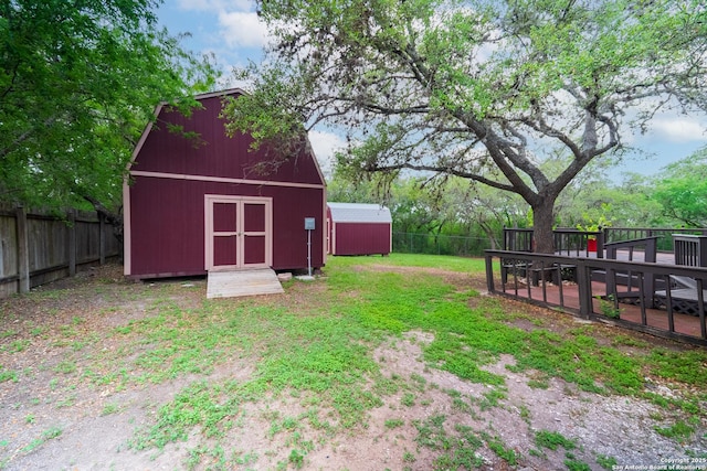 1903 Copperfield, San Antonio, TX 78251 - view of yard featuring an outdoor structure, a fenced backyard, and a shed