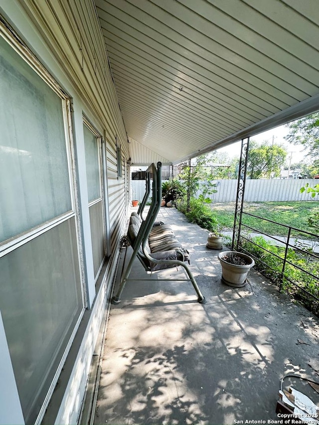 view of patio with fence
