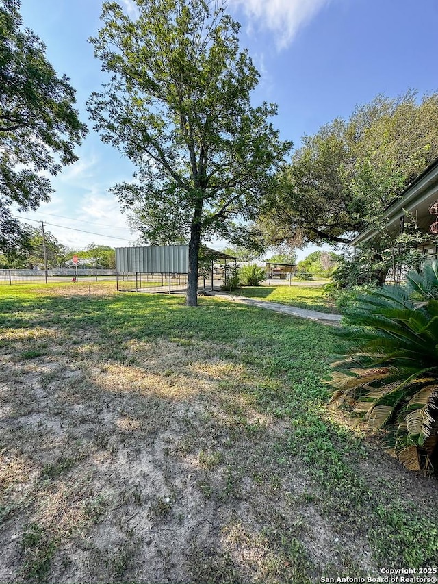 view of yard featuring fence