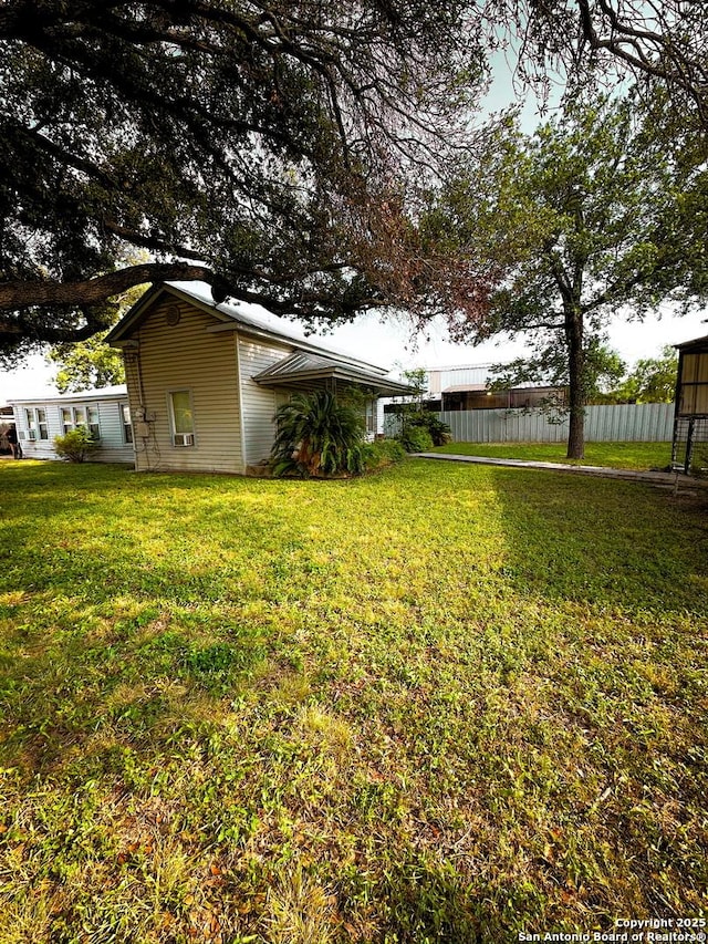 view of yard with fence
