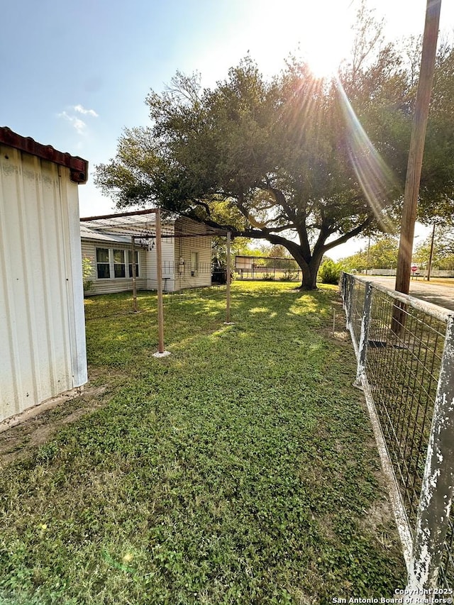 view of yard with fence
