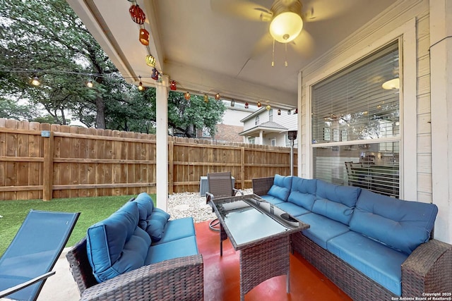 view of patio with fence and outdoor lounge area