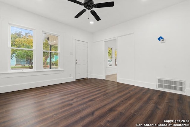 interior space with ceiling fan, recessed lighting, baseboards, wood finished floors, and visible vents