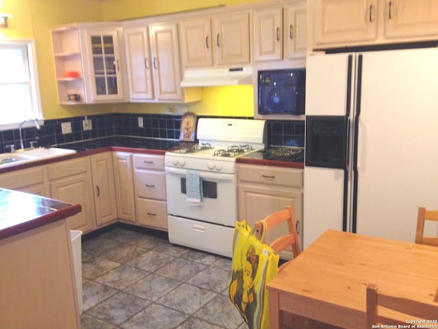 416 Alexander Hamilton, San Antonio, TX 78228 - kitchen with white appliances, under cabinet range hood, a sink, tasteful backsplash, and open shelves