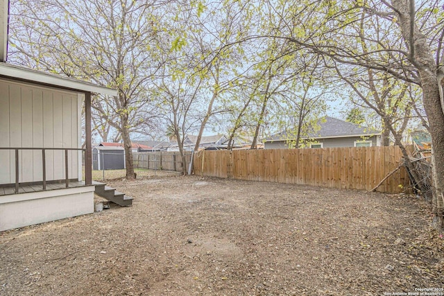 view of yard featuring a fenced backyard