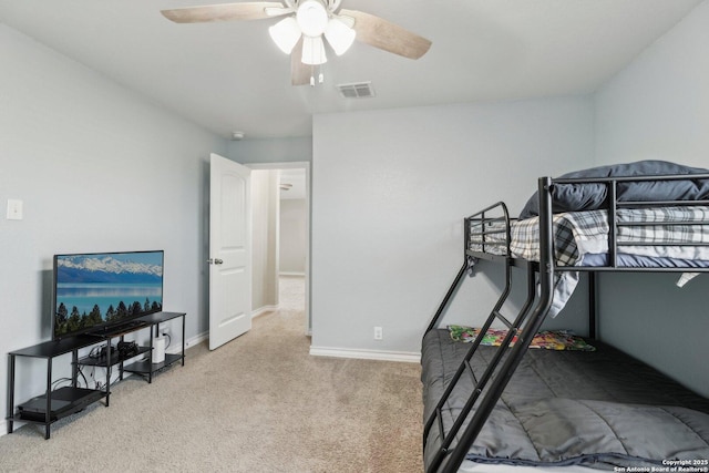 bedroom with baseboards, ceiling fan, carpet, and visible vents