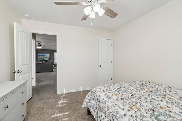 bedroom with carpet floors, baseboards, and ceiling fan