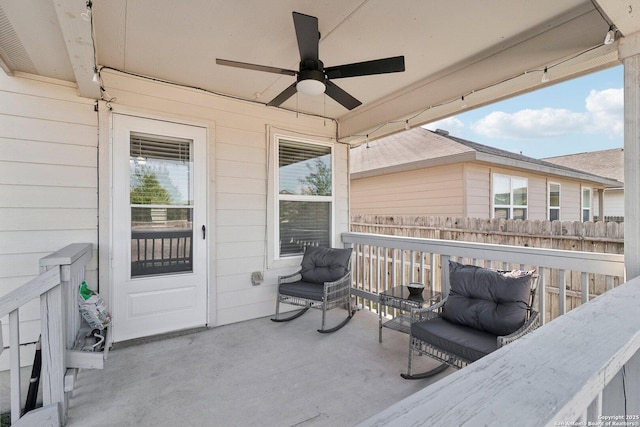 deck featuring a patio, ceiling fan, and fence