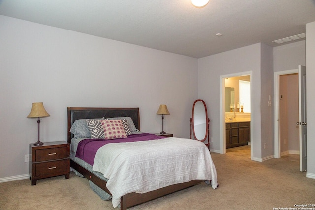 8220 Robin Gate, Selma, TX 78154 - bedroom featuring baseboards, visible vents, light carpet, and ensuite bath