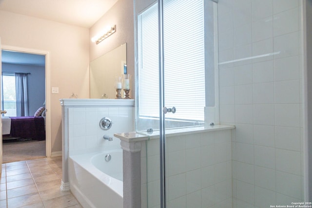 8220 Robin Gate, Selma, TX 78154 - ensuite bathroom with tile patterned floors, a bath, and connected bathroom