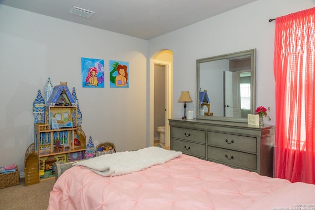 8220 Robin Gate, Selma, TX 78154 - bedroom with arched walkways, carpet, and visible vents