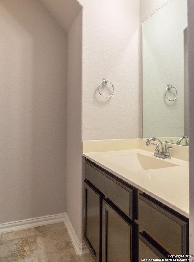 8220 Robin Gate, Selma, TX 78154 - bathroom with baseboards and vanity