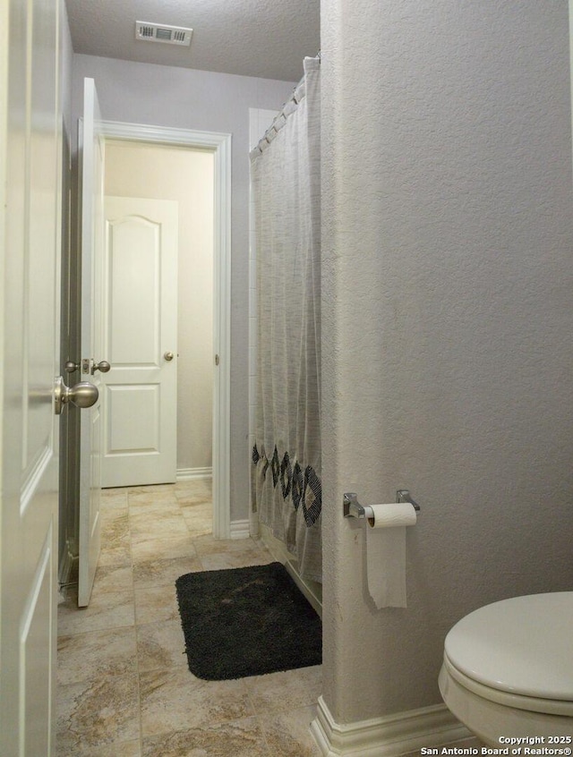8220 Robin Gate, Selma, TX 78154 - bathroom featuring toilet and visible vents