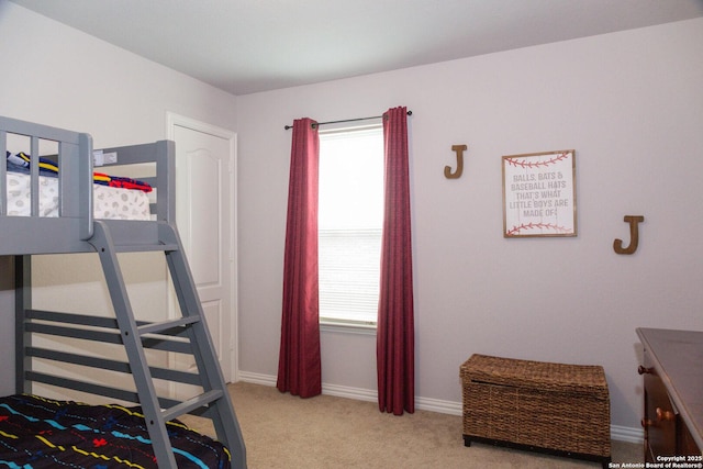 8220 Robin Gate, Selma, TX 78154 - bedroom featuring baseboards and light carpet
