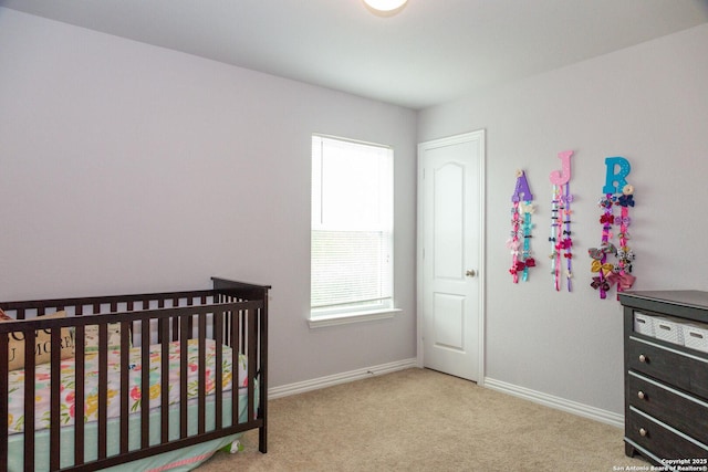 8220 Robin Gate, Selma, TX 78154 - bedroom featuring carpet flooring, a nursery area, and baseboards