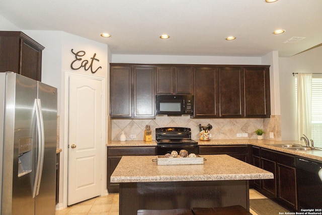 8220 Robin Gate, Selma, TX 78154 - kitchen featuring dark brown cabinetry, backsplash, a sink, black appliances, and recessed lighting