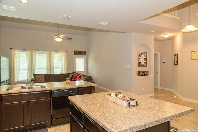 8220 Robin Gate, Selma, TX 78154 - kitchen featuring visible vents, a center island, dishwasher, a sink, and open floor plan