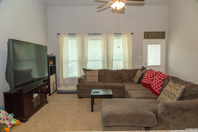 8220 Robin Gate, Selma, TX 78154 - living room with a ceiling fan, a high ceiling, light carpet, and a wealth of natural light
