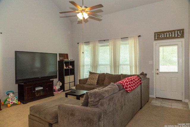 8220 Robin Gate, Selma, TX 78154 - tiled living room featuring a ceiling fan, carpet flooring, and high vaulted ceiling