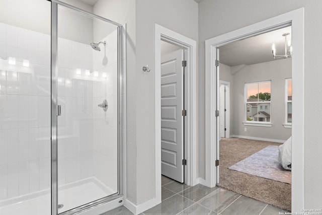 15011 Wychwood, San Antonio, TX 78233 - bathroom featuring connected bathroom, baseboards, tile patterned floors, and a stall shower