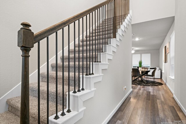 15011 Wychwood, San Antonio, TX 78233 - stairs with baseboards and wood finished floors