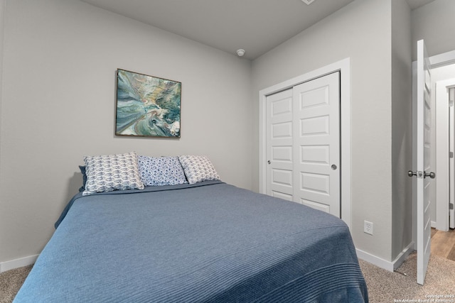 15011 Wychwood, San Antonio, TX 78233 - bedroom with baseboards, light carpet, and a closet