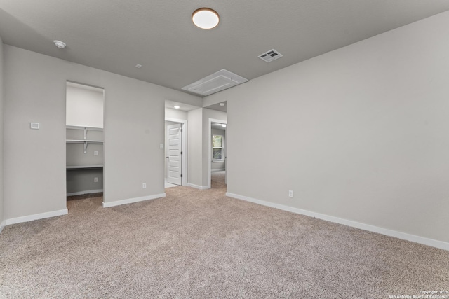 15011 Wychwood, San Antonio, TX 78233 - carpeted spare room with baseboards, attic access, and visible vents
