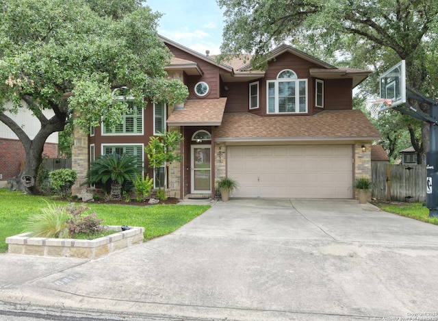 8811 Silent Strm, San Antonio, TX 78250 - view of front facade featuring a garage, a front lawn, fence, roof with shingles, and concrete driveway