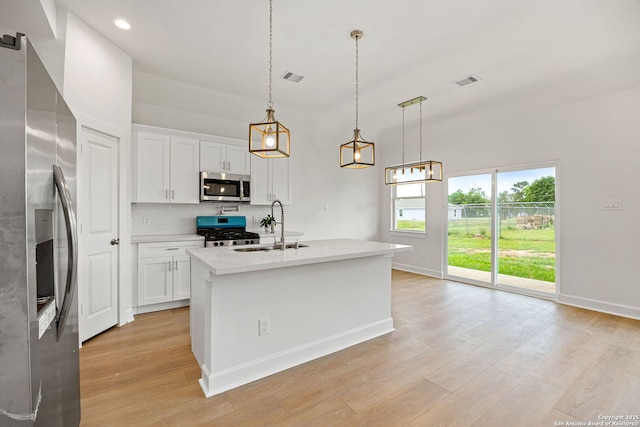 25 Main, Hempstead, TX 77445 - kitchen with a sink, light countertops, stainless steel appliances, tasteful backsplash, and visible vents