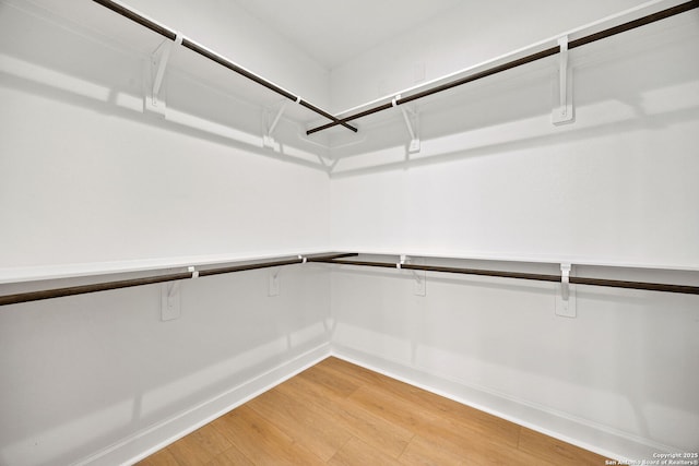 25 Main, Hempstead, TX 77445 - walk in closet featuring light wood-style floors