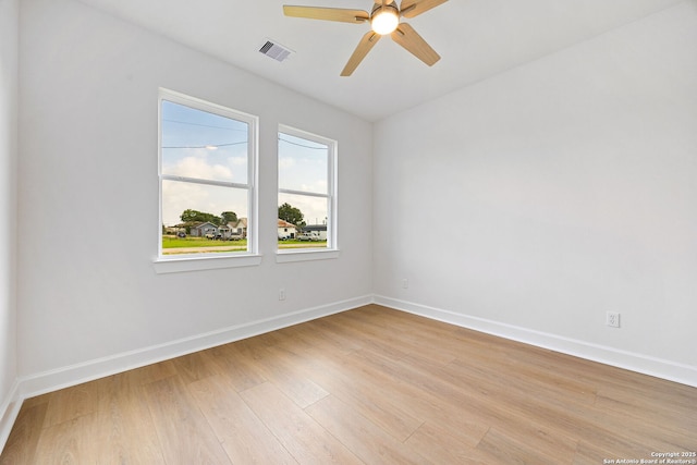 25 Main, Hempstead, TX 77445 - empty room featuring baseboards, light wood finished floors, and visible vents